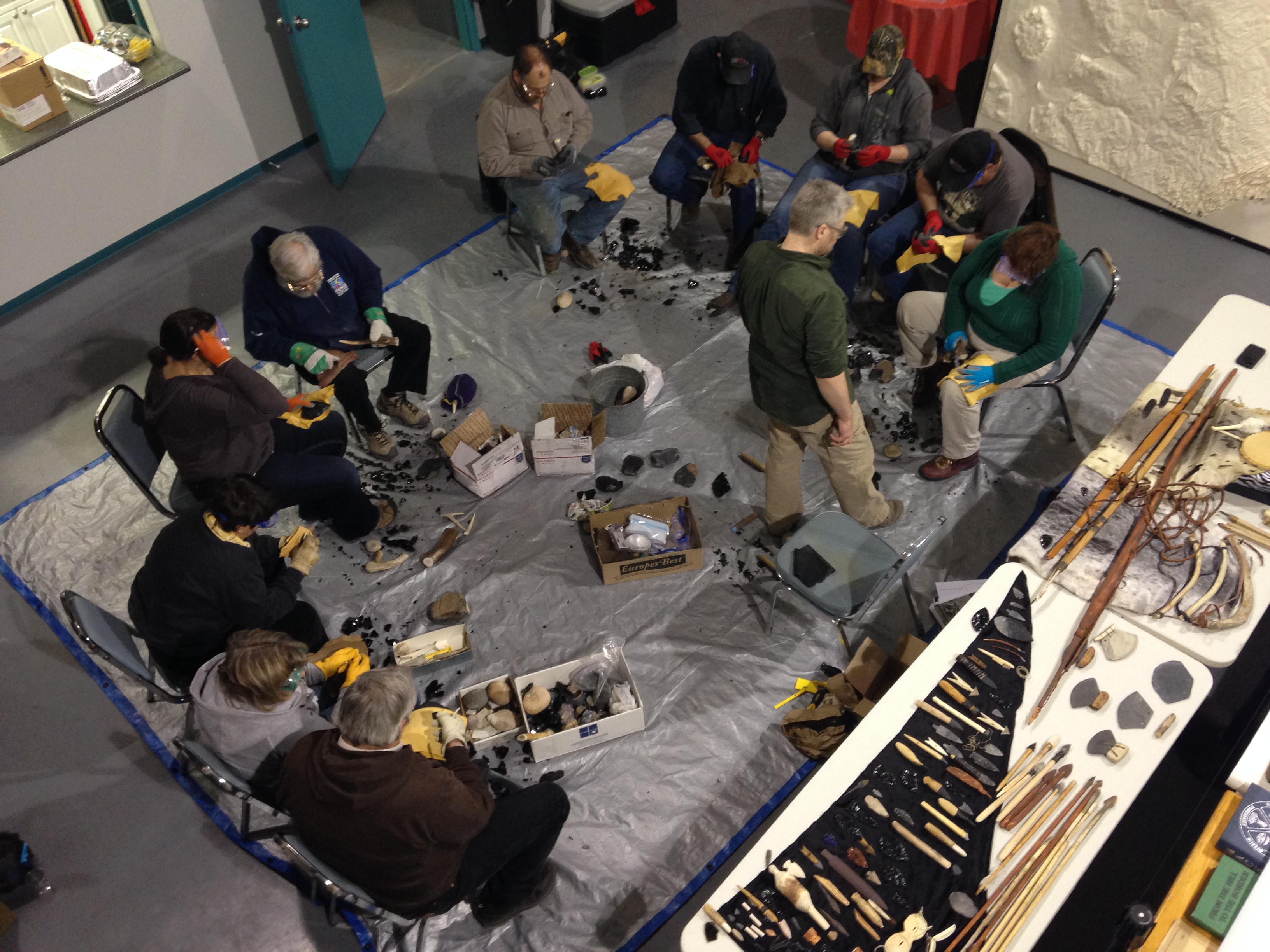 Members of the Bodo Archaeology Society learning flintknapping